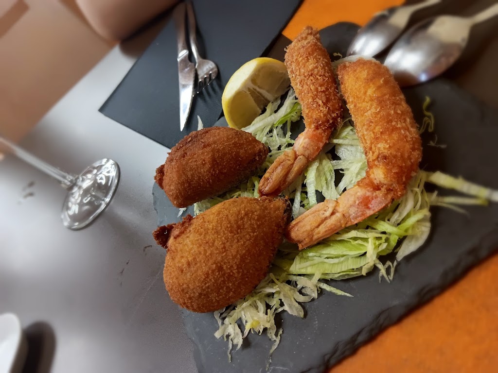 La Taberna de Laso — Comida y bebida