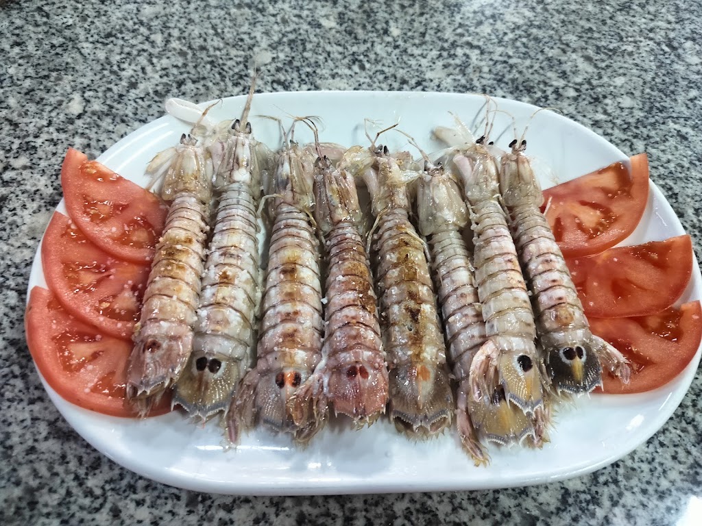 Bar 20 De Tapas — Comida y bebida