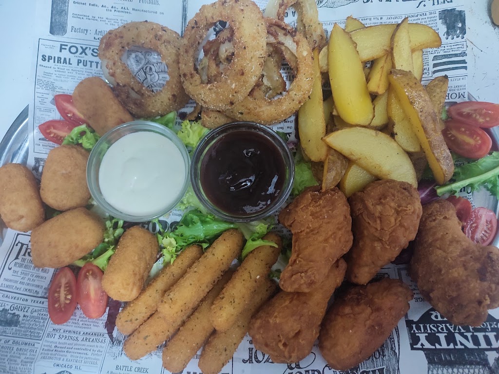 Cerveceria Bar La Mancha — Comida y bebida