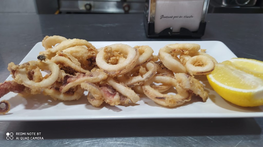Bar Rey Chico — Comida y bebida