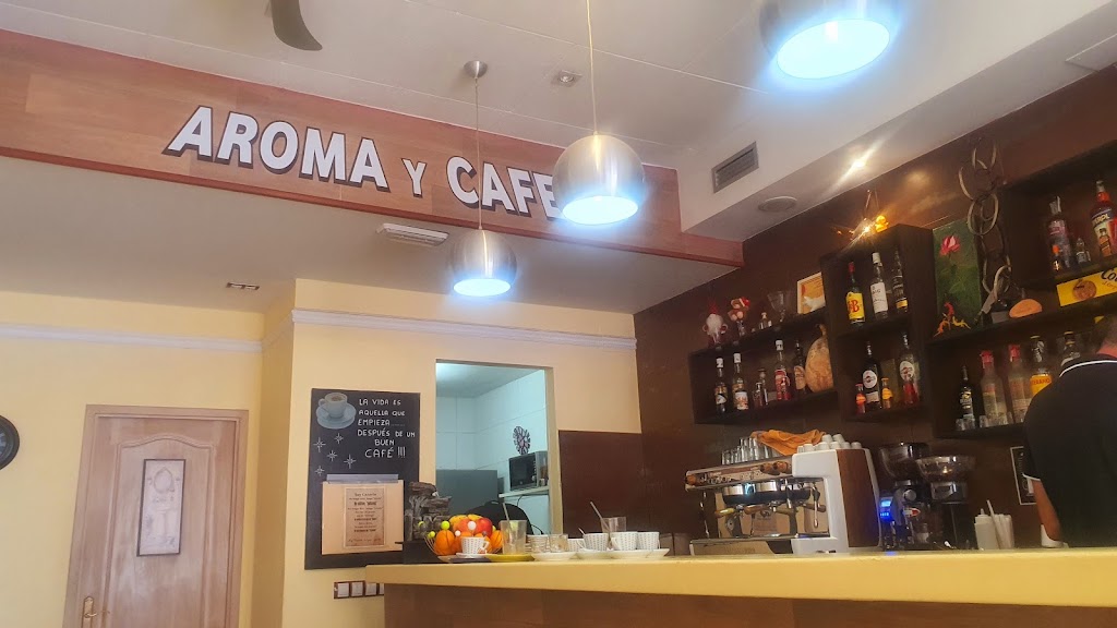 Entre Aroma y Cafe — Ambiente