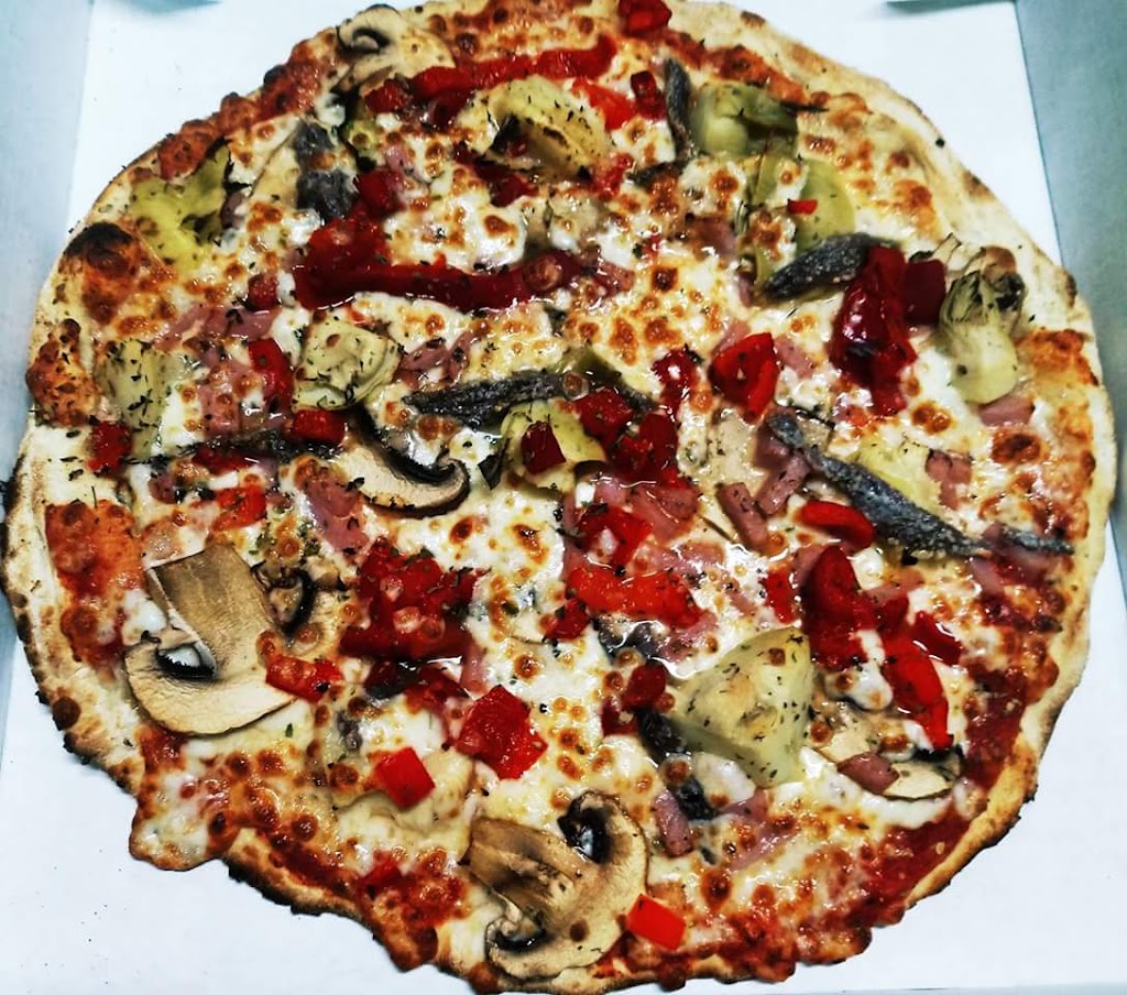 Pizzeria Ciao Utrera — Comida y bebida