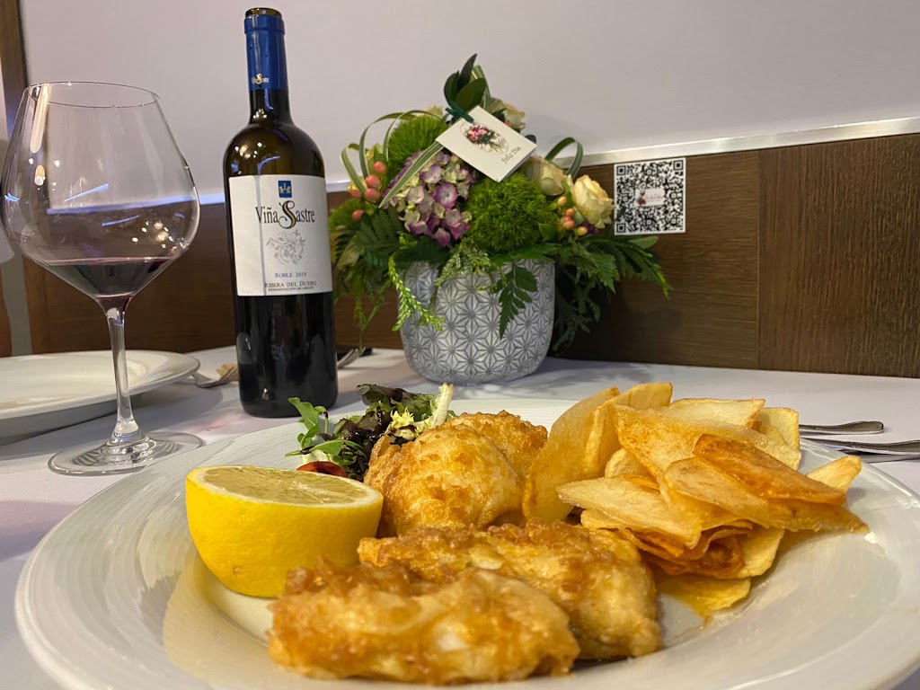 A de Pako Restaurante Vinoteca — Comida y bebida