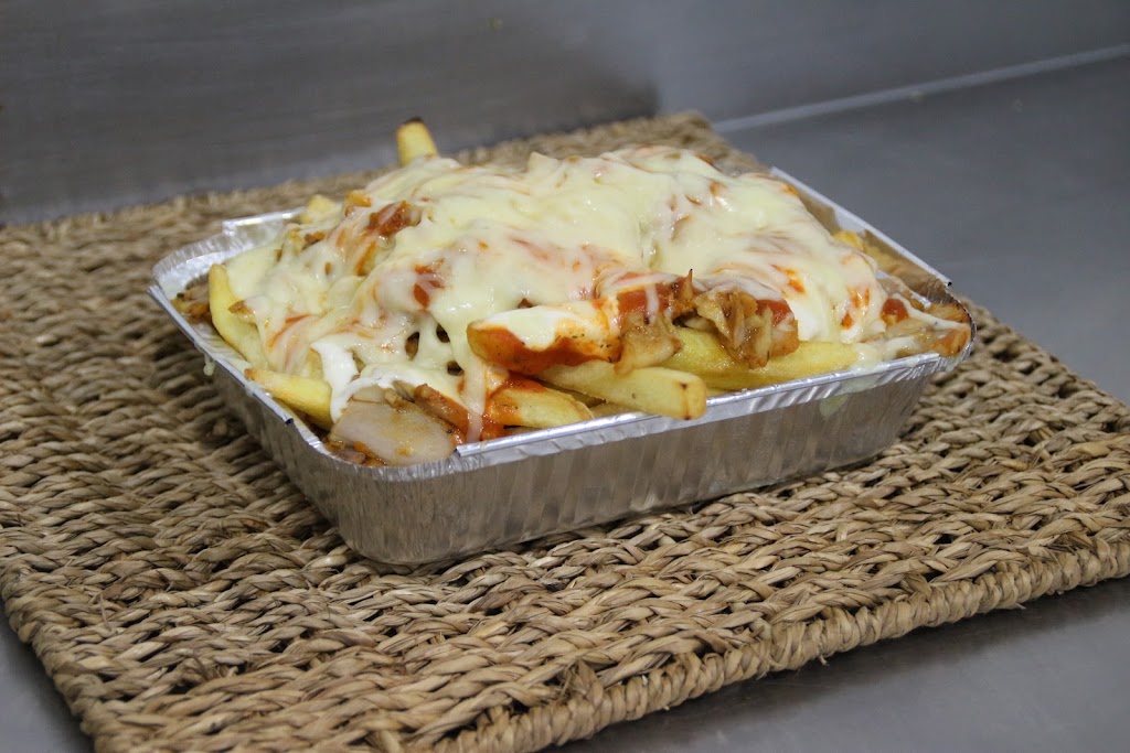 Mio Sole Pizzeria — Comida y bebida
