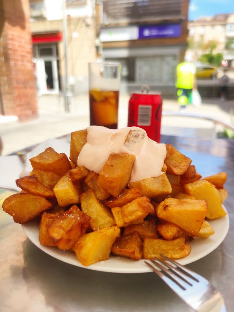 Los Manchegos — Comida y bebida