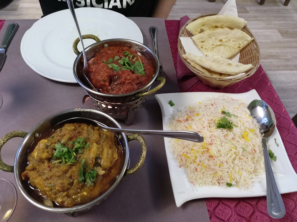 Zishi Punjab Restaurant — Comida y bebida