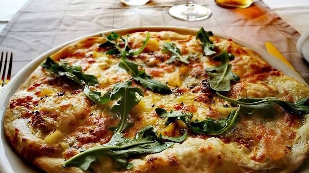 Pizzeria Artesanal Il Bacio — Comida y bebida