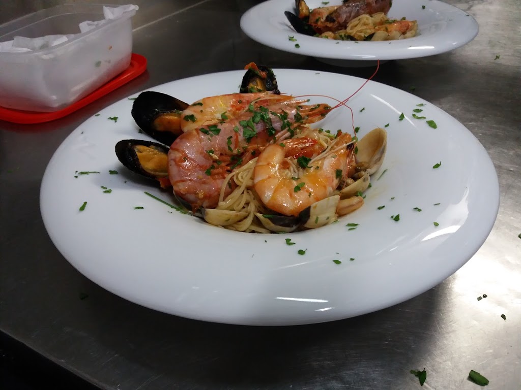 Restaurante pizzeria L' Italiano — Comida y bebida
