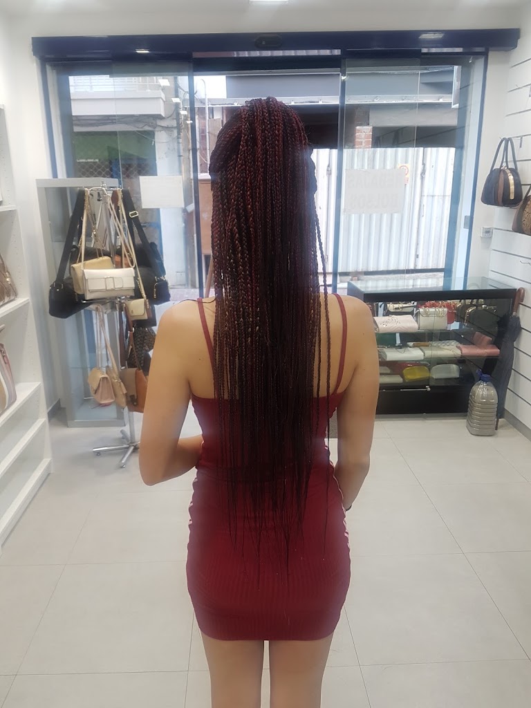 Ndindi trenzas — Peinado
