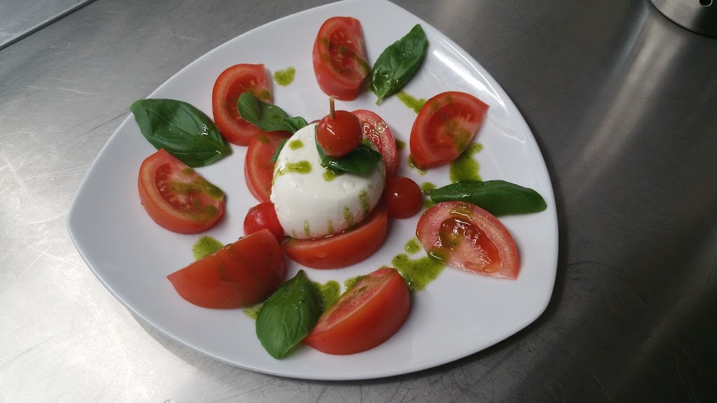 Restaurante La Piccola Italia scq Pizzeria — Comida y bebida