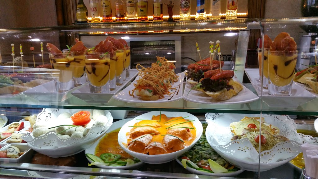 El Andaluz Arroceria Taperia. — Comida y bebida
