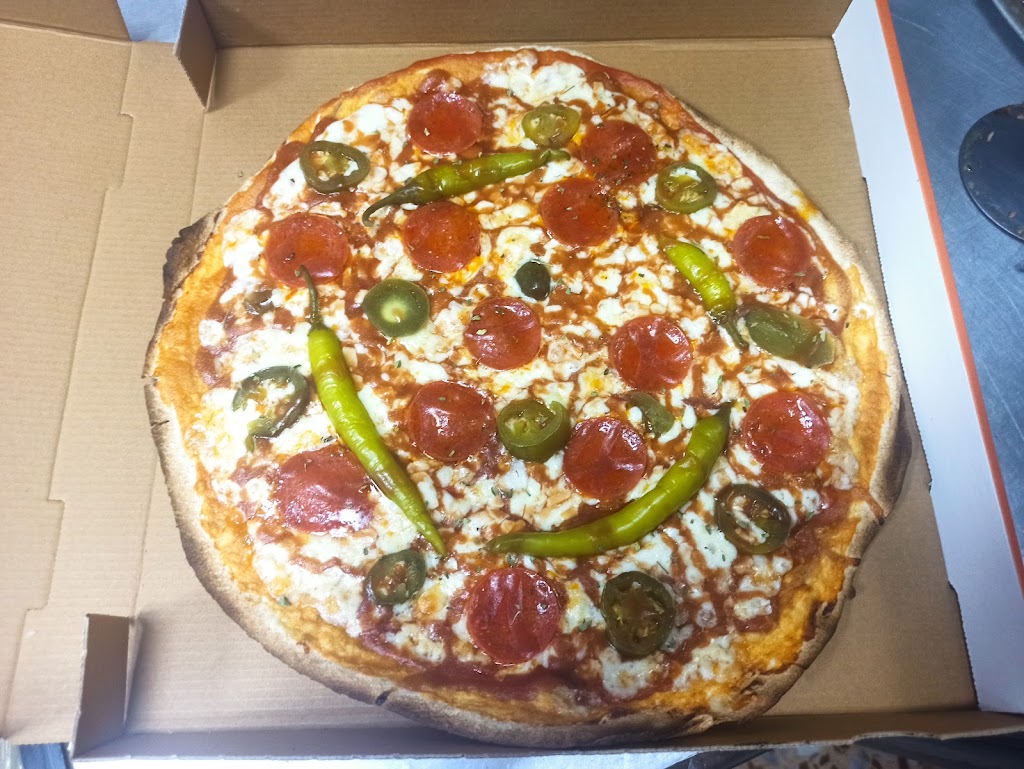 El bodegon Latino — Pizza