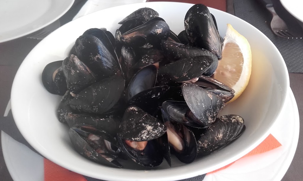 Restaurante Topi's — Comida y bebida