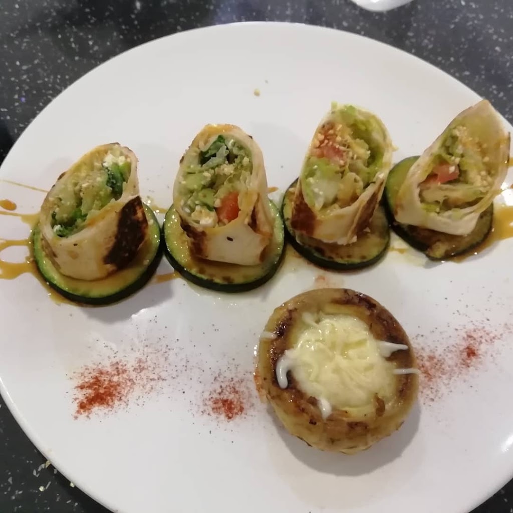La Tutoria — Comida y bebida