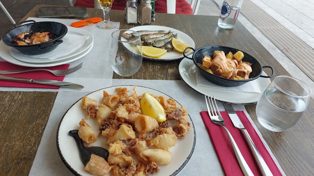 Can Pou — Comida y bebida