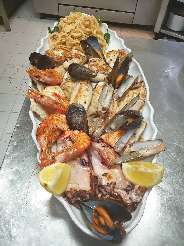 Restaurante Hoyo 10 — Comida y bebida