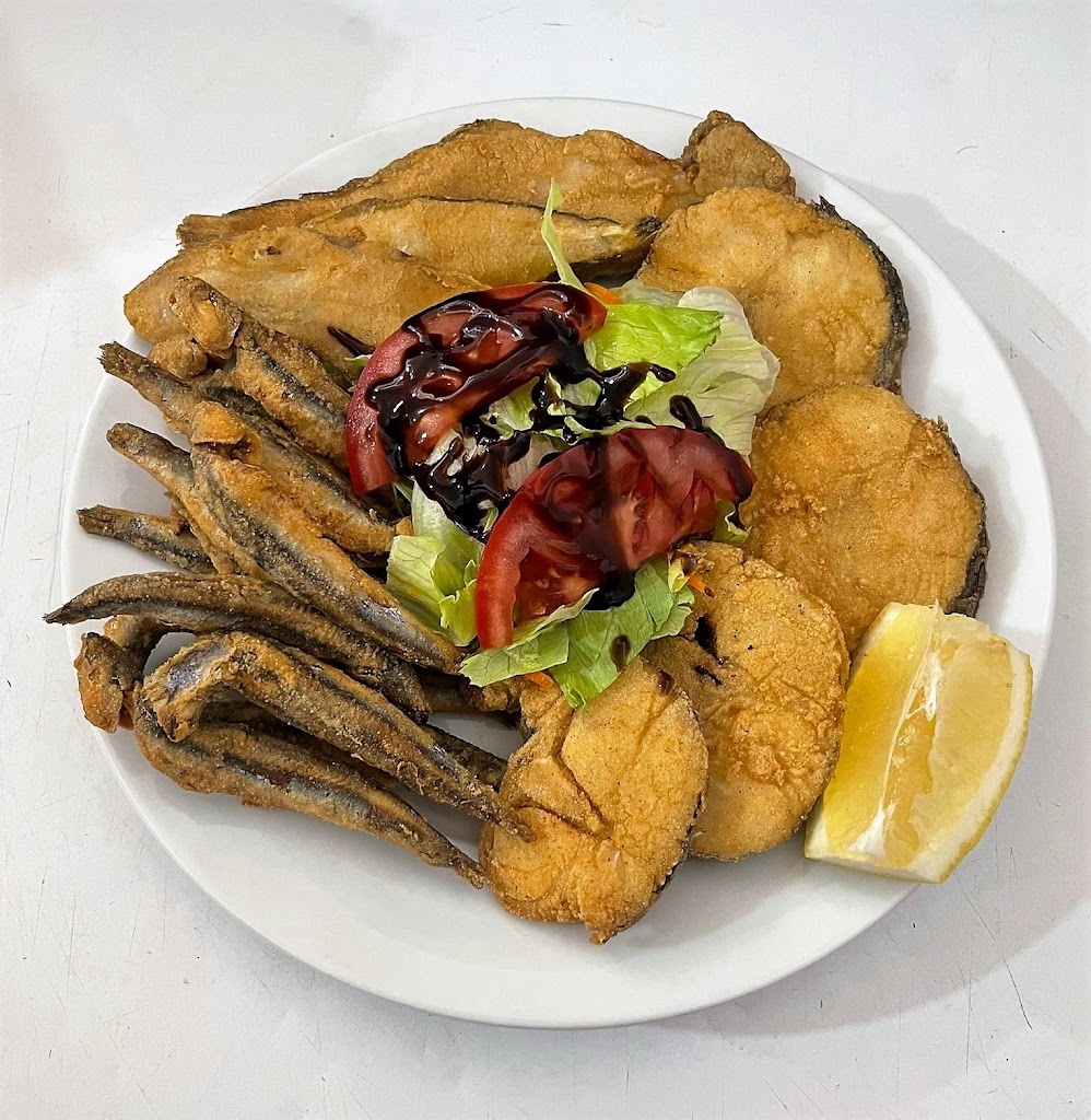 M D & L Bar de Tapas en Utrera — Comida y bebida