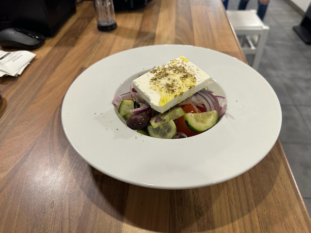 SANTORINI SUVLAKI Bar Restaurante — Del propietario