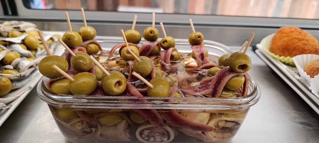 La Taberna de Rosa — Comida y bebida