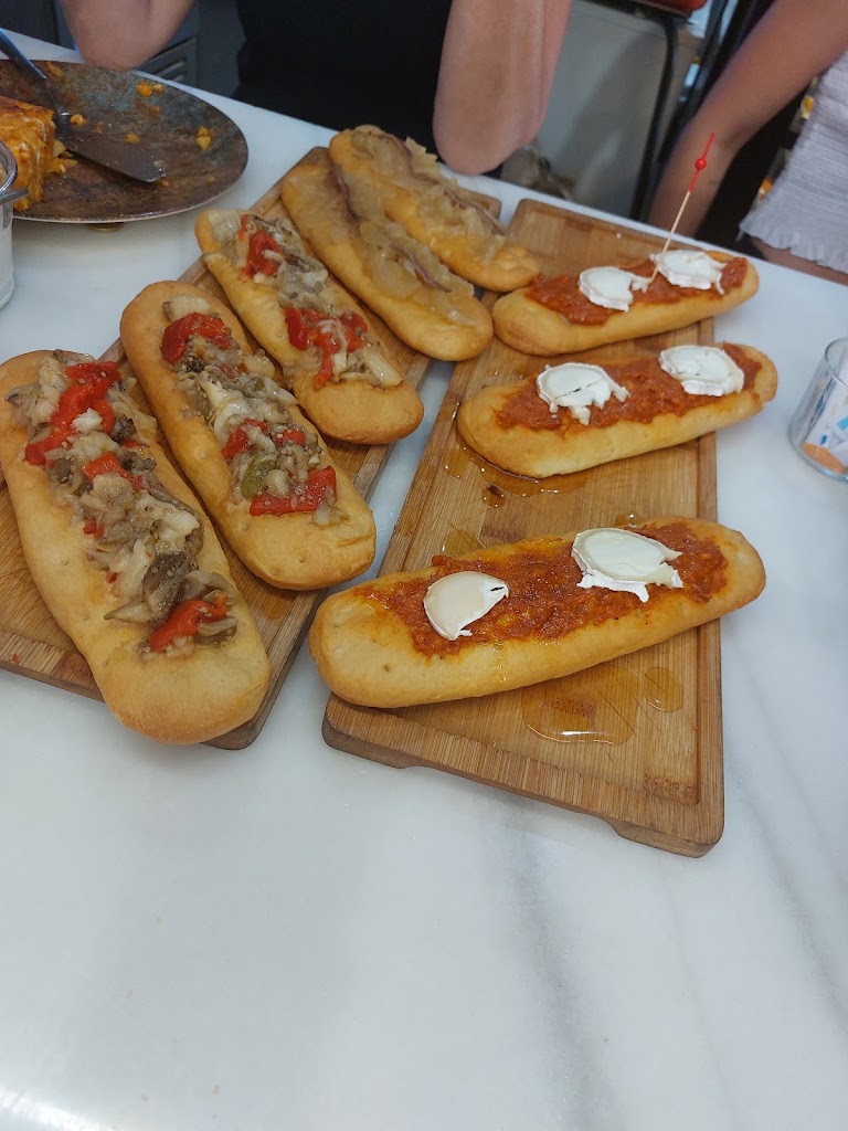 Ca Mariola — Comida y bebida