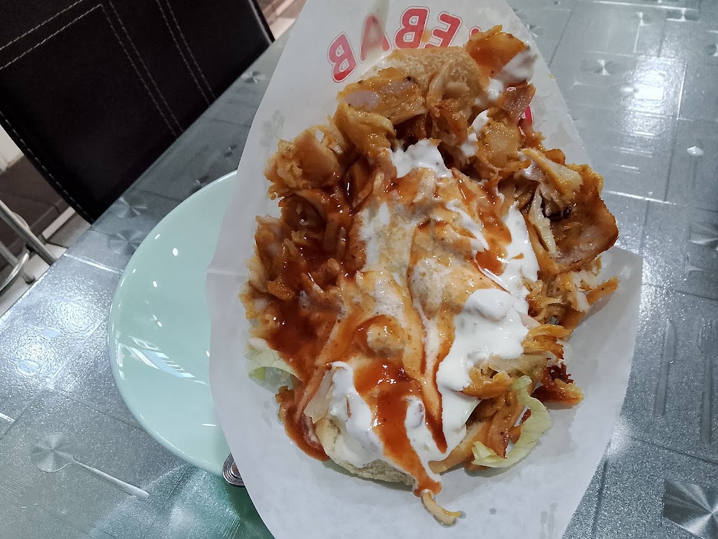 Shani Pizza Kebab La Perla — Comida y bebida