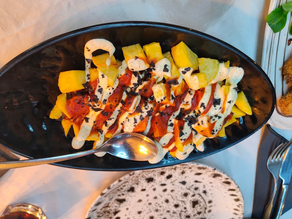 El Loco Angel braseria — Patatas bravas