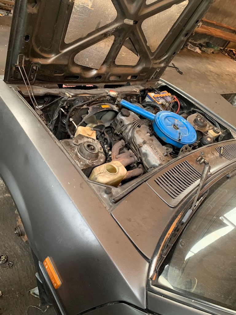 Bengkel Mobil Abadi Motor