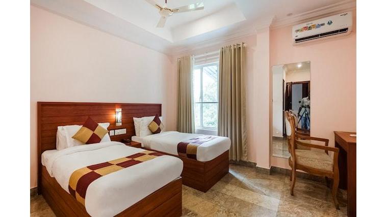 Capital O 47340 Aruna Tourist Home