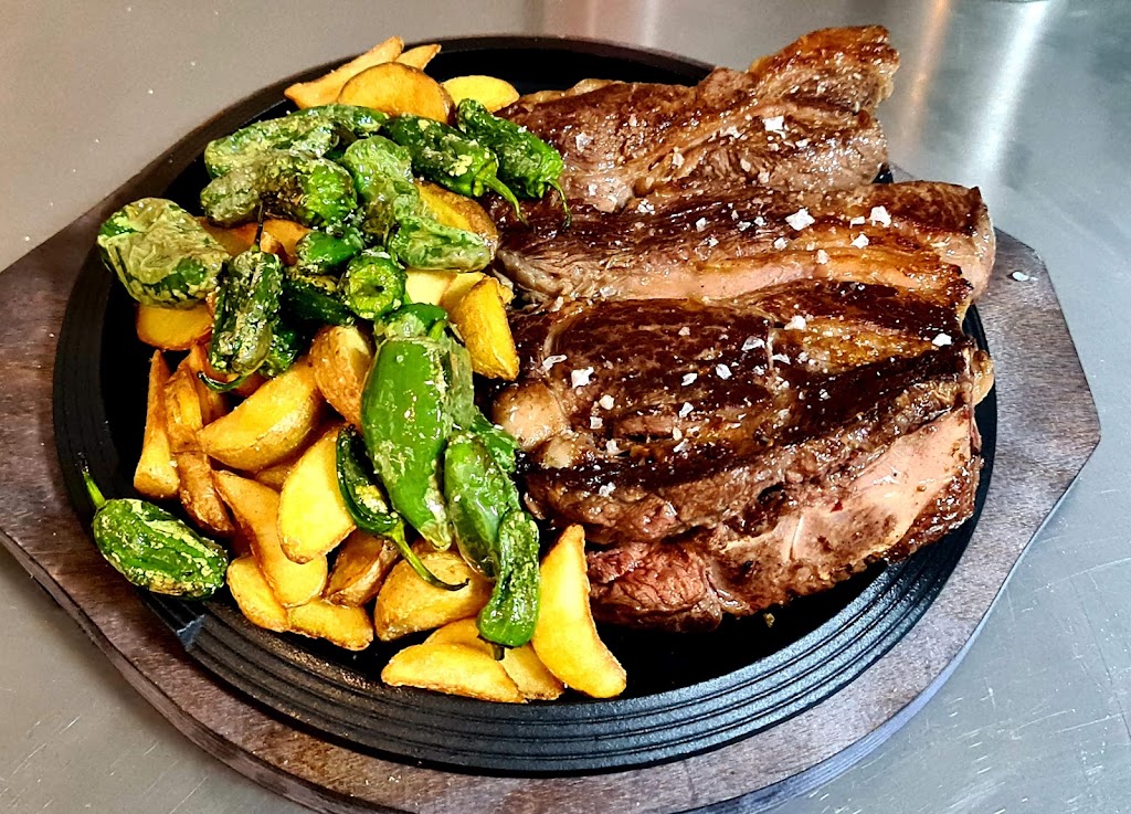 El Quinto Cono — Comida y bebida