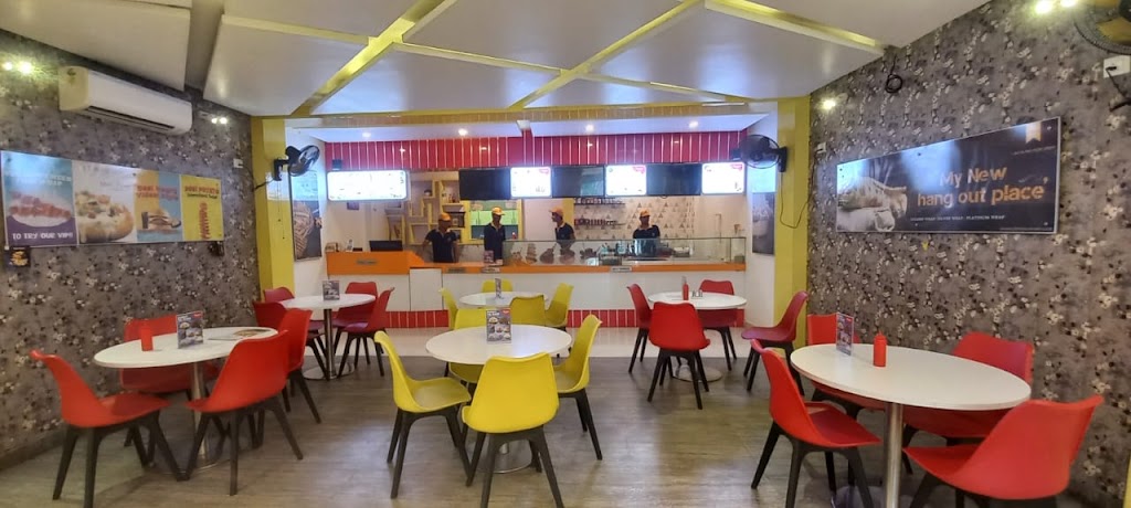 Yellow House Cafe Near Kubera Lingam