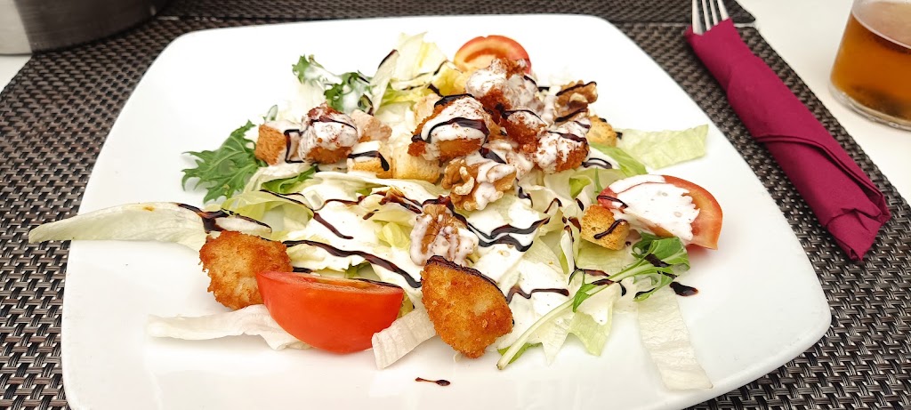 La Muralla Restaurante — Comida y bebida