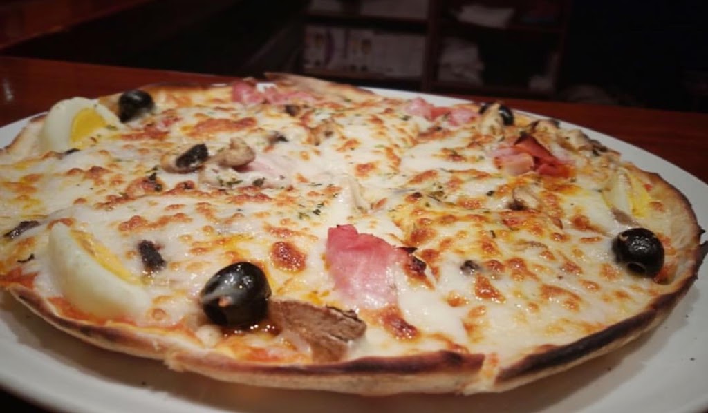 Restaurante italiano pizzeria Capone — Pizza