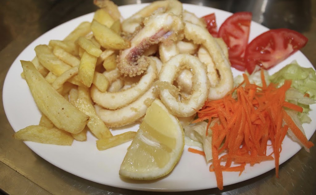 La Amistad - Bar Grill — Comida y bebida