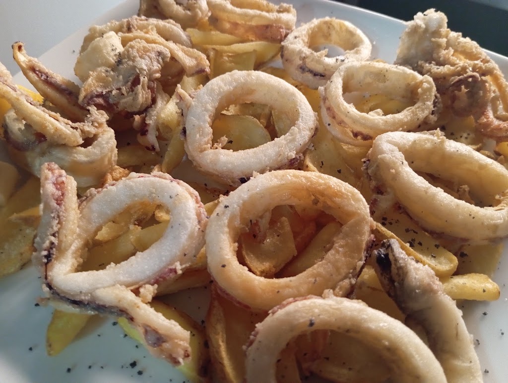 Bar El Comienzo — Comida y bebida