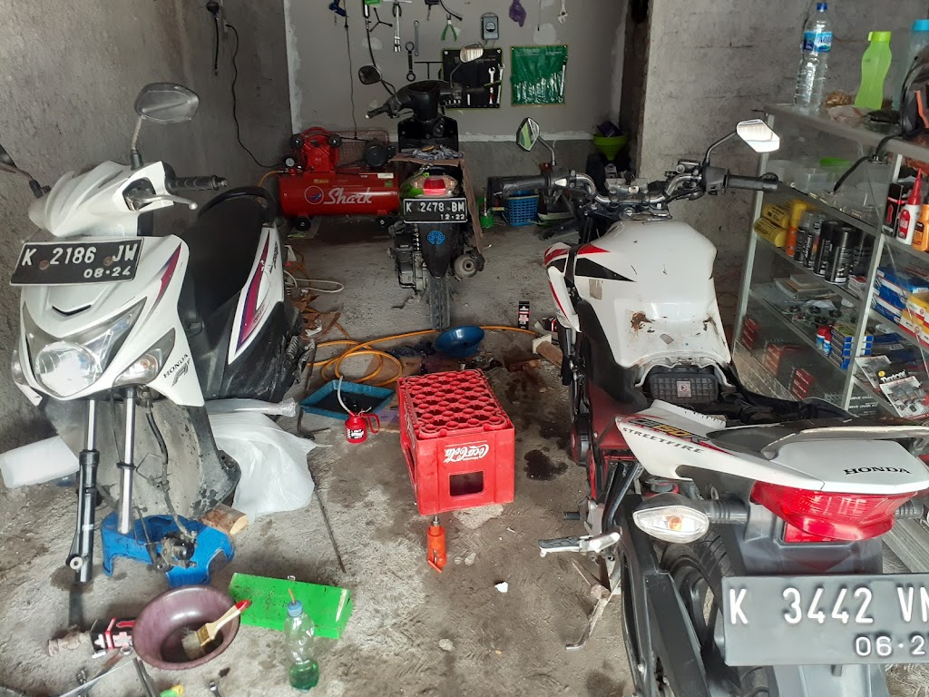 BORNEO MOTOR bengkel spesialis injeksi
