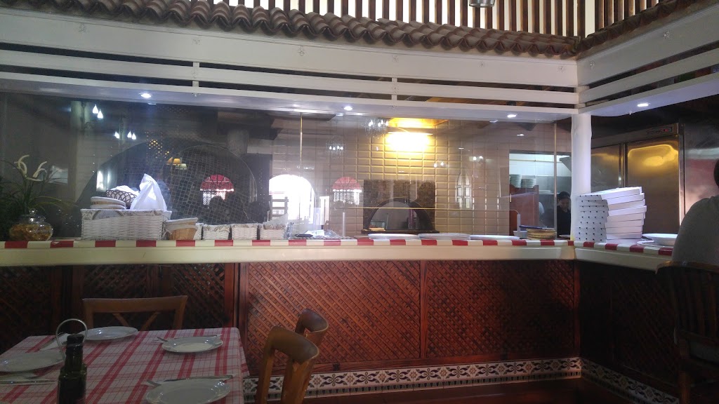 PIZZERIA EL CAPRICHO — Ambiente