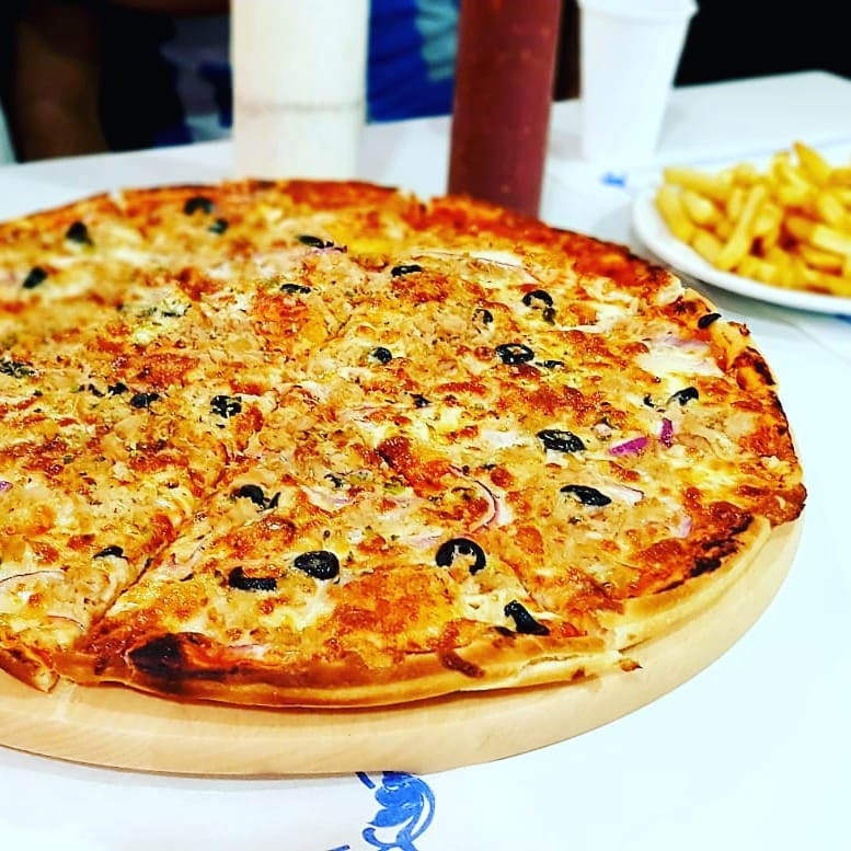 TAJ BAR & RESTAURANTE — Comida y bebida