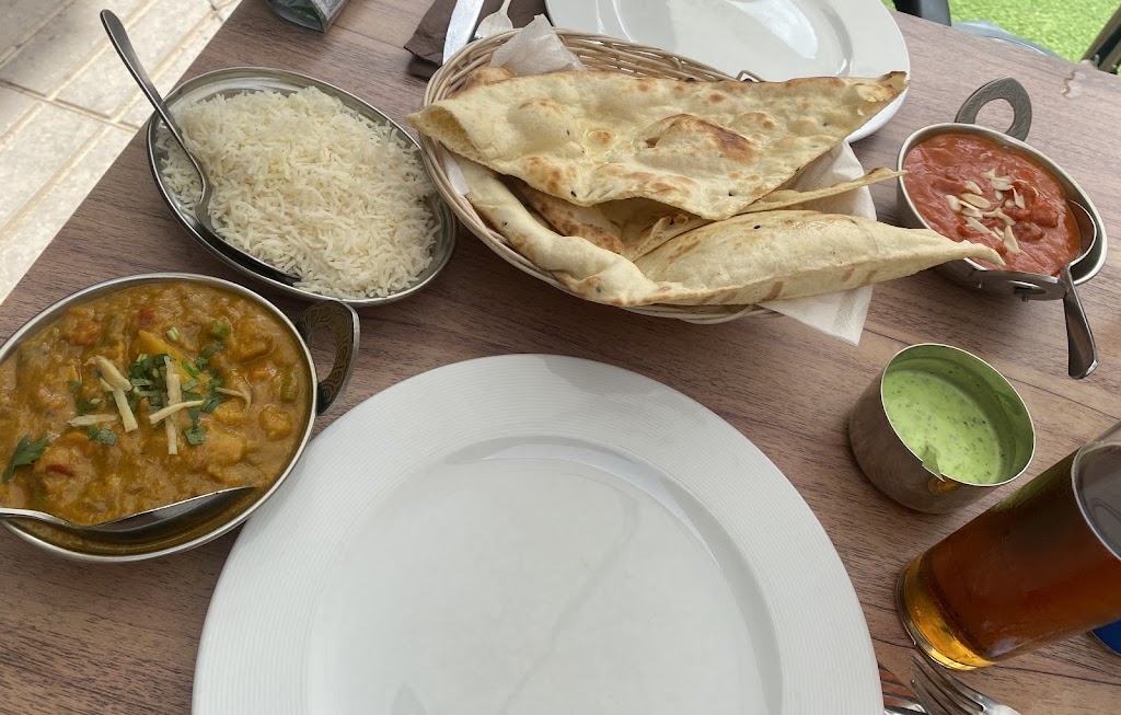 MASALA INDIAN RESTAURANT — Pollo con mantequilla