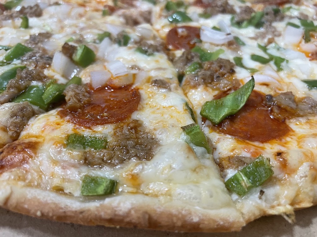 Pizzeria Napoles CHIPIONA — Comida y bebida