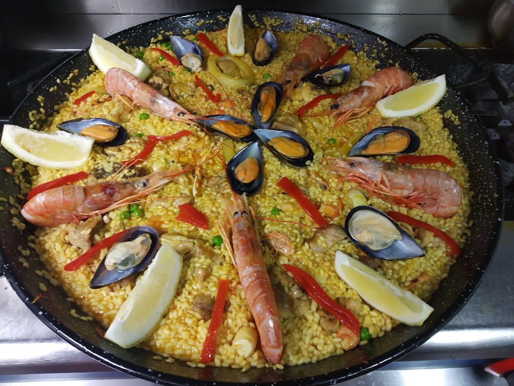 A FUEGO LENTO — Paella