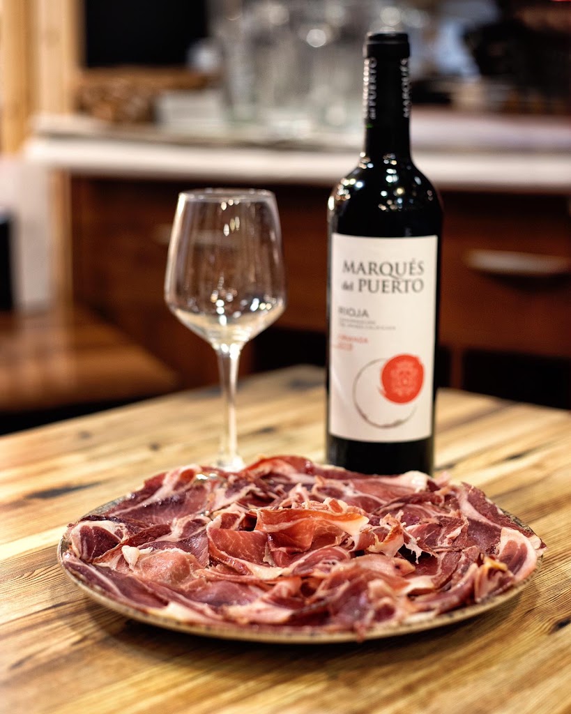 El Capricho Iberico — Comida y bebida