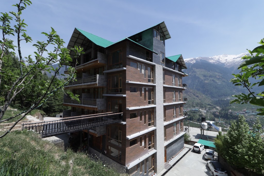 Gezellig Inn Vardhan Hills