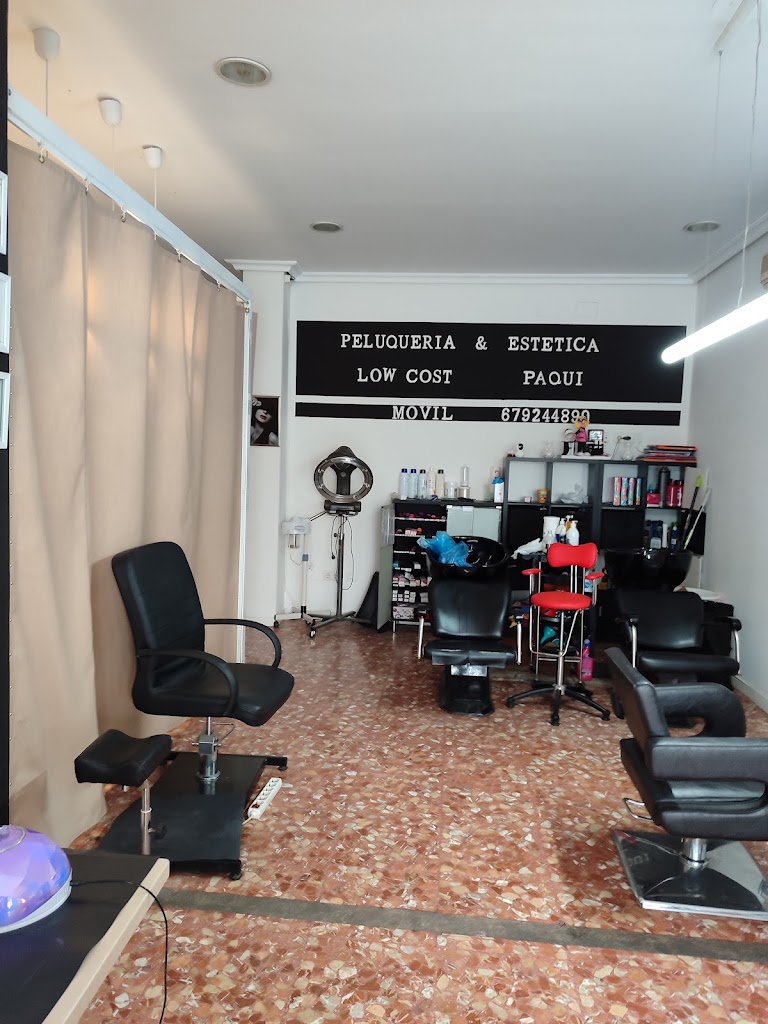 PELUQUERIA Y ESTETICA LOW COST PAQUI — Interior