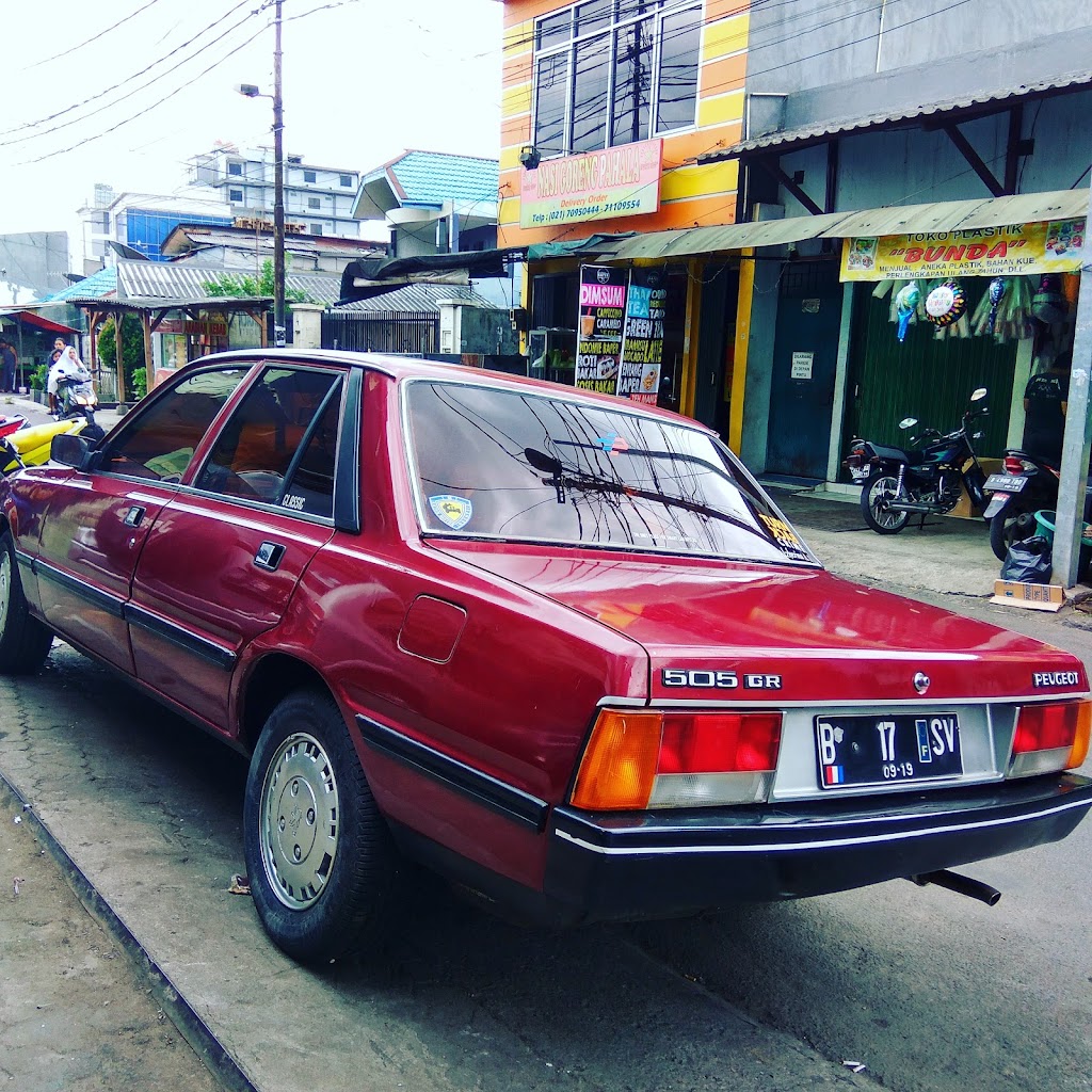 Bengkel Mobil Gaya Baru