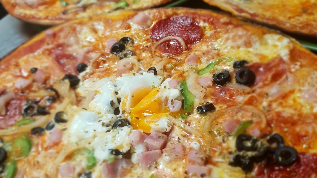 Taberna pizzeria La Cobija — Comida y bebida
