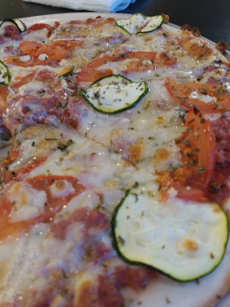 Kiriki pizzeria y pollos asados — Comida y bebida