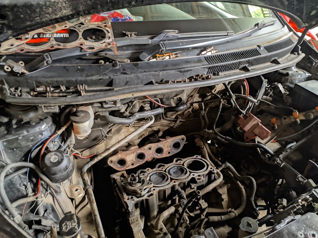 bengkel mobil adi jaya
