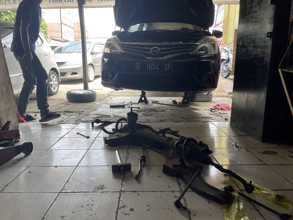 KARUNIA MOTOR ( BENGKEL KAKI-KAKI MOBIL )