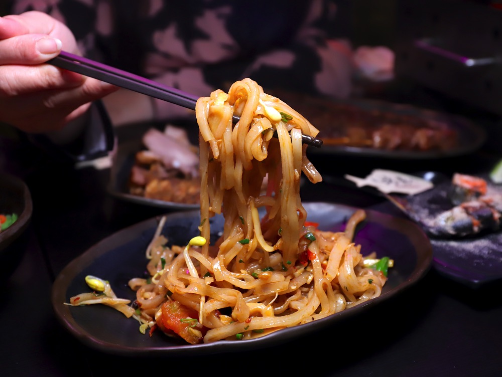 賣烤魚的。 的照片