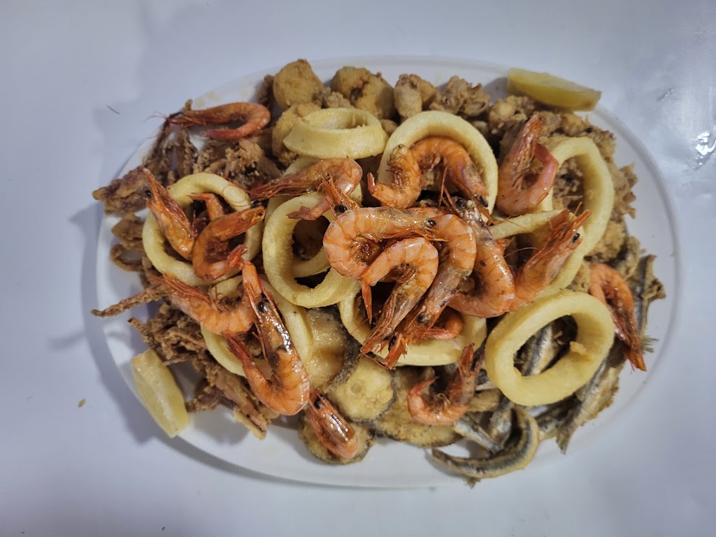 Bar La Rabida. — Comida y bebida